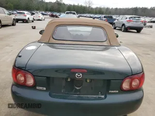 2001 Mazda MX-5 Miata z VIN JM1NB353810212392, wystawiony jako Copart lot #44398295 z przebiegiem 88 601 mil mil oraz Szkoda całkowita • Salvage title. Historia ofert i sprzedaży dostępna na DreamBid. Obrazek 6.
