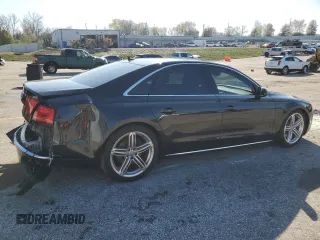 2013 Audi A8 3.0L with VIN WAUAGAFD0DN002546, listed as a Copart auction lot 81145504 with 107,079 mi miles and Salvage title. Bid and sale history available at DreamBid. Image 3.