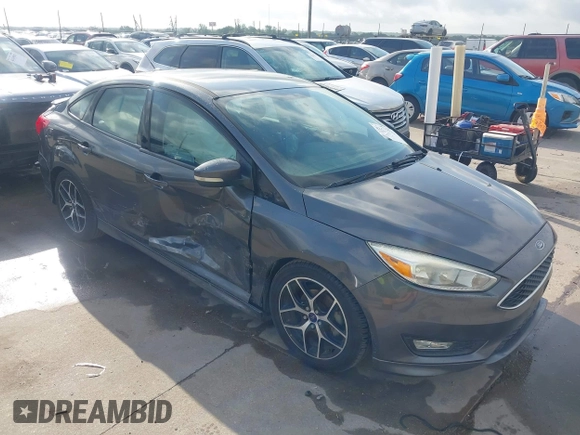 2016 Ford Focus SE z VIN 1FADP3F28GL360512, wystawiony jako IAAI lot #42427723 z przebiegiem 217 172 mil mil oraz . Historia ofert i sprzedaży dostępna na DreamBid. Obrazek 1.