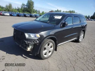 2014 Dodge Durango Limited z VIN 1C4RDJDG3EC381597, wystawiony jako Copart lot #55788515 z przebiegiem 148 532 mil mil oraz Szkody całkowita. Historia ofert i sprzedaży dostępna na DreamBid. Obrazek 1.