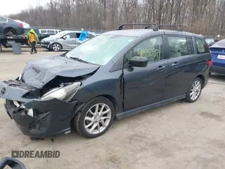 2012 Mazda 5 Touring with VIN JM1CW2CL6C0107233, listed as a IAAI auction lot 41332199 with 130,428 mi miles and . Bid and sale history available at DreamBid. Image 17.