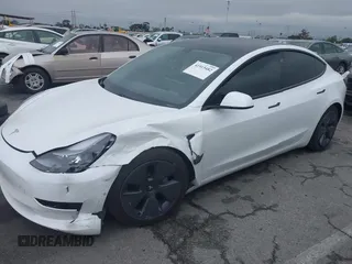 2021 Tesla Model 3 Long Range with VIN 5YJ3E1EB6MF878957, listed as a IAAI auction lot 41915482 with 59,578 mi miles. Bid and sale history available at carsss.com. Image 19.