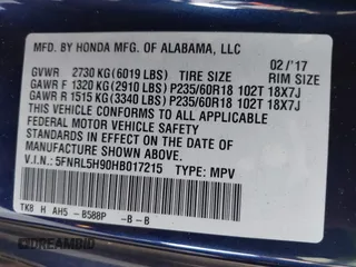 2017 Honda Odyssey Touring with VIN 5FNRL5H90HB017215, listed as a IAAI auction lot 42574528 with 61,386 mi miles and . Bid and sale history available at DreamBid. Image 9.