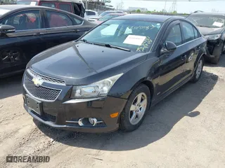 2014 Chevrolet Cruze 1LT with VIN 1G1PC5SB2E7149180, listed as a IAAI auction lot 42010987 with 122,787 mi miles. Bid and sale history available at carsss.com. Image 2.