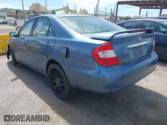 2004 Toyota Camry LE with VIN 4T1BE32K14U793314, listed as a IAAI auction lot 42031924 with 169,164 mi miles. Bid and sale history available at carsss.com. Image 3.