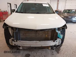 2021 Chevrolet Traverse LS with VIN 1GNERFKW8MJ166905, listed as a IAAI auction lot 42044937 with 96,542 mi miles and . Bid and sale history available at DreamBid. Image 6.
