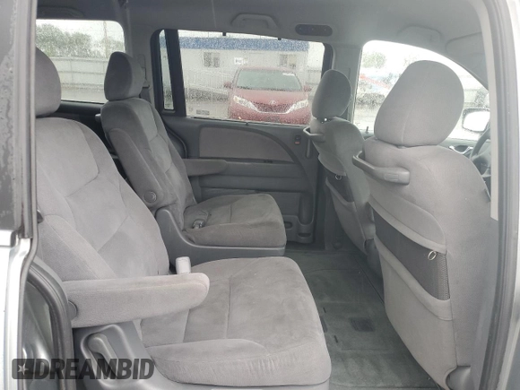 2007 Honda Odyssey EX с VIN 5FNRL38487B033136, выставлен на аукционе Copart как лот 57620335 с пробегом 272 702 миль миль и Списание • Salvage title. История ставок и продаж доступна на DreamBid. Изображение 11.
