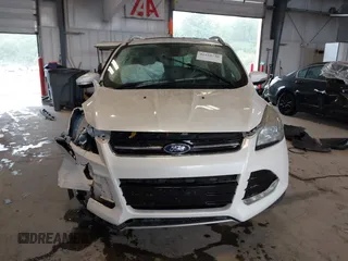 2016 Ford Escape Titanium with VIN 1FMCU9J90GUA18743, listed as a IAAI auction lot 42419730 with 102,666 mi miles and . Bid and sale history available at DreamBid. Image 13.