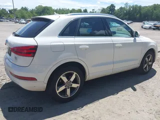 2015 Audi Q3 Premium Plus z VIN WA1EFCFS7FR012210, wystawiony jako IAAI lot #42771683 z przebiegiem 229 799 mil mil oraz . Historia ofert i sprzedaży dostępna na DreamBid. Obrazek 4.