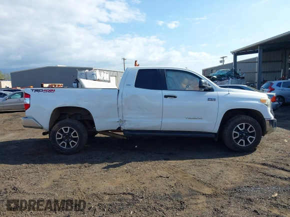 2014 Toyota Tundra 4WD Truck SR with VIN 5TFUY5F1XEX385475, listed as a IAAI auction lot 41563188 with 135,310 mi miles. Bid and sale history available at carsss.com. Image 13.