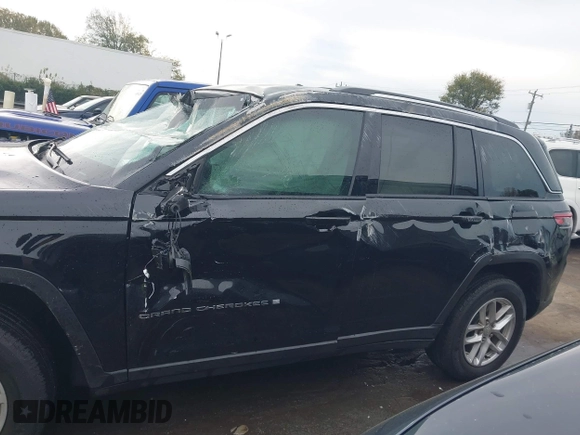 2023 Jeep Grand Cherokee Laredo with VIN 1C4RJHAG6PC671728, listed as a IAAI auction lot 40897386 with Not provided miles and . Bid and sale history available at DreamBid. Image 13.