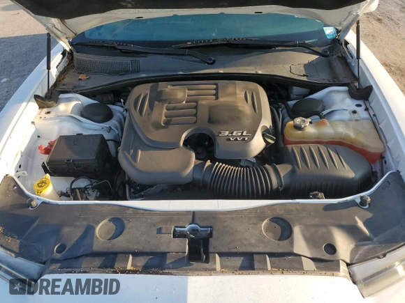 2013 Dodge Charger SXT with VIN 2C3CDXHG4DH709127, listed as a Copart auction lot 73497904 with 61,866 mi miles and Salvage Title. Bid and sale history available at carsss.com. Image 12.