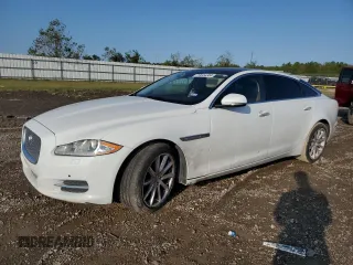 2014 Jaguar XJ Portfolio with VIN SAJWA2GZ3E8V60788, listed as a Copart auction lot 43272405 with 97,196 mi miles and Salvage title. Bid and sale history available at DreamBid. Image 1.