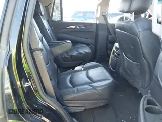 2015 Cadillac Escalade Luxury z VIN 1GYS4MKJ7FR661209, wystawiony jako IAAI lot #40645720 z przebiegiem Nie podano mil oraz . Historia ofert i sprzedaży dostępna na DreamBid. Obrazek 8.