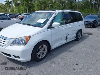 2008 Honda Odyssey Touring with VIN 5FNRL38858B006304, listed as a IAAI auction lot 41814309 with 208,778 mi miles. Bid and sale history available at carsss.com. Image 6.