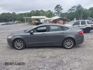 2017 Ford Fusion SE z VIN 3FA6P0HD6HR174945, wystawiony jako IAAI lot #42416548 z przebiegiem 128 410 mil mil oraz . Historia ofert i sprzedaży dostępna na DreamBid. Obrazek 14.
