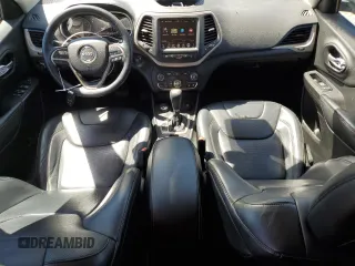 2014 Jeep Cherokee Limited z VIN 1C4PJMDS1EW170001, wystawiony jako Copart lot #57645655 z przebiegiem 154 098 mil mil oraz Szkoda całkowita • Salvage title. Historia ofert i sprzedaży dostępna na DreamBid. Obrazek 8.