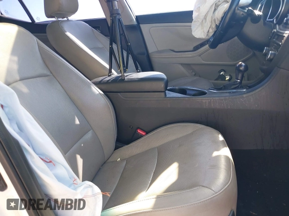 2015 Kia Optima EX with VIN 5XXGN4A73FG377402, listed as a IAAI auction lot 41209243 with 217,948 mi miles. Bid and sale history available at carsss.com. Image 5.
