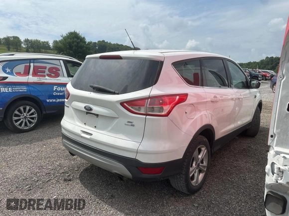 2013 Ford Escape SE with VIN 1FMCU9G92DUD72105, listed as a IAAI auction lot 42731657 with 213,477 mi miles and . Bid and sale history available at DreamBid. Image 17.