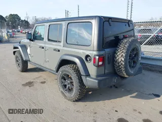 2022 Jeep Wrangler Unlimited Sport with VIN 1C4HJXDN7NW156538, listed as a IAAI auction lot 41526074 with 27,082 mi miles and . Bid and sale history available at DreamBid. Image 3.
