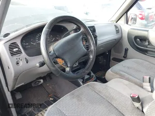 1999 Ford Ranger XLT with VIN 1FTYR14X0XPB77848, listed as a IAAI auction lot 41521029 with 139,595 mi miles. Bid and sale history available at carsss.com. Image 13.