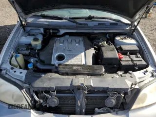 2004 Kia Sedona LX with VIN KNDUP131646582289, listed as a Copart auction lot 47321625 with 207,453 mi miles and Salvage Title. Bid and sale history available at carsss.com. Image 12.