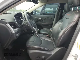 2014 Jeep Cherokee Trailhawk with VIN 1C4PJMBS9EW140344, listed as a Copart auction lot 50579005 with 117,326 mi miles and Salvage Title. Bid and sale history available at carsss.com. Image 7.