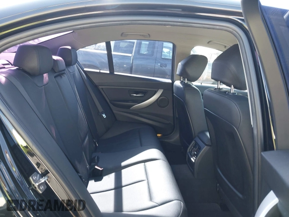 2013 BMW 3 Series 320i with VIN WBA3B1C57DF461779, listed as a IAAI auction lot 41991156 with 134,592 mi miles. Bid and sale history available at carsss.com. Image 8.
