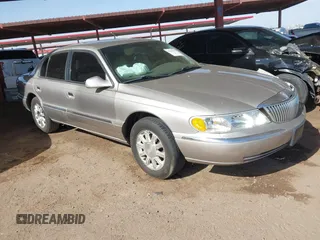 2002 Lincoln Continental with VIN 1LNHM97V62Y696179, listed as a IAAI auction lot 41745567 with 110,514 mi miles. Bid and sale history available at carsss.com. Image 1.