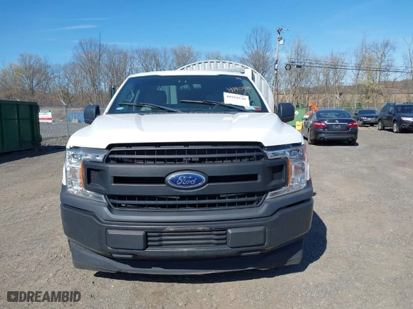 2019 Ford F-150 XL with VIN 1FTMF1CB1KKC53743, listed as a IAAI auction lot 41910136 with 106,461 mi miles. Bid and sale history available at carsss.com. Image 12.