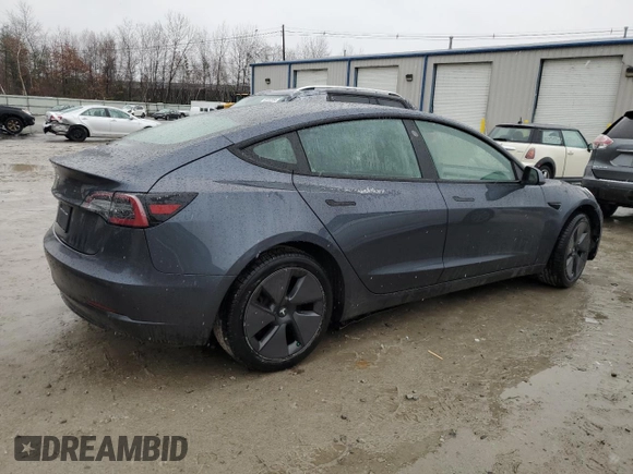 2021 Tesla Model 3 Standard Range Plus with VIN 5YJ3E1EA0MF907358, listed as a Copart auction lot 82103164 with 37,529 mi miles and Salvage Title. Bid and sale history available at DreamBid. Image 3.