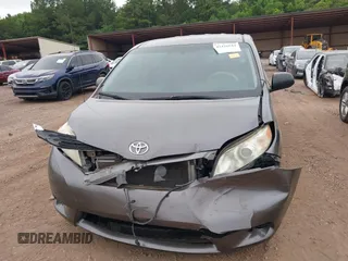 2014 Toyota Sienna L with VIN 5TDZK3DC8ES470837, listed as a IAAI auction lot 42426844 with 302,661 mi miles and . Bid and sale history available at DreamBid. Image 12.