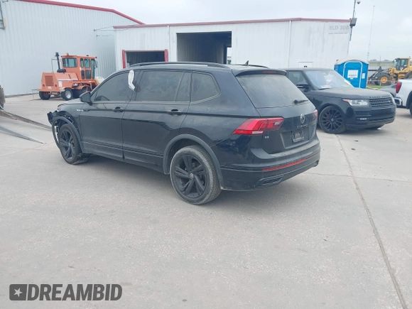 2023 Volkswagen Tiguan SE R-Line Black with VIN 3VVCB7AX1PM106543, listed as a IAAI auction lot 41784559 with 39,846 mi miles and . Bid and sale history available at DreamBid. Image 3.