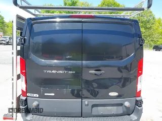 2015 Ford Transit Cargo z VIN 1FTBW2YG7FKA20201, wystawiony jako IAAI lot #42253463 z przebiegiem 83 235 mil mil oraz . Historia ofert i sprzedaży dostępna na DreamBid. Obrazek 6.