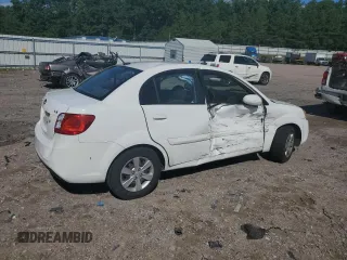 2010 Kia Rio LX with VIN KNADH4A31A6635895, listed as a Copart auction lot 61308434 with 209,016 mi miles and Salvage Title. Bid and sale history available at carsss.com. Image 3.