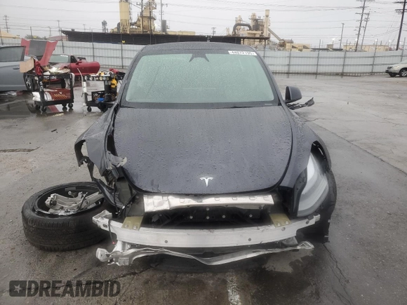 2024 Tesla Model Y with VIN 7SAYGDED1RF098054, listed as a Copart auction lot 44072195 with 16,085 mi miles and Salvage Title. Bid and sale history available at DreamBid. Image 5.