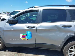 2015 Jeep Cherokee Sport z VIN 1C4PJLAB4FW730836, wystawiony jako IAAI lot #42517979 z przebiegiem 144 383 mil mil oraz . Historia ofert i sprzedaży dostępna na DreamBid. Obrazek 14.