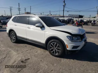 2020 Volkswagen Tiguan SE z VIN 3VV3B7AX6LM107732, wystawiony jako Copart lot #52038695 z przebiegiem 27 317 mil mil oraz Szkoda całkowita • Salvage title. Historia ofert i sprzedaży dostępna na DreamBid. Obrazek 4.