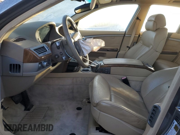 2006 BMW 7 Series 750i with VIN WBAHL83596DT03728, listed as a Copart auction lot 87855795 with 127,513 mi miles and Salvage title. Bid and sale history available at DreamBid. Image 7.