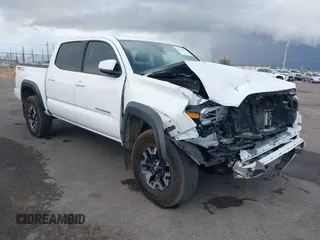 2020 Toyota Tacoma SR5 with VIN 3TMAZ5CN2LM133990, listed as a IAAI auction lot 41423069 with 56,184 mi miles and . Bid and sale history available at DreamBid. Image 1.