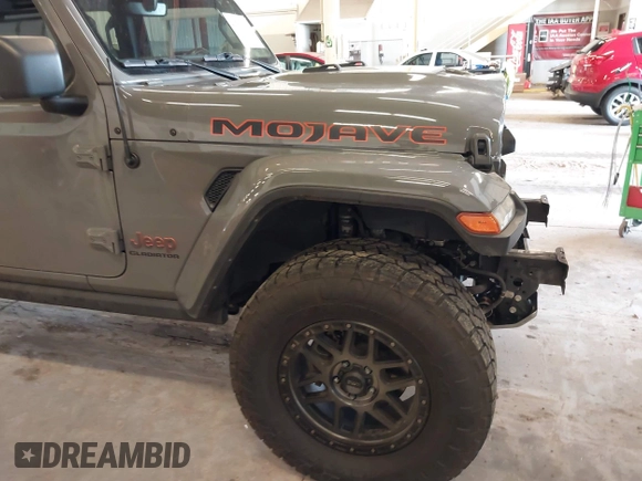 2021 Jeep Gladiator Mojave with VIN 1C6JJTEG1ML596109, listed as a IAAI auction lot 41783913 with 71,112 mi miles and . Bid and sale history available at DreamBid. Image 21.
