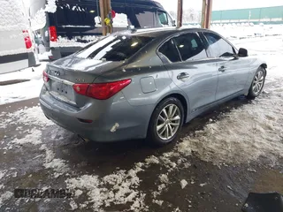 2015 Infiniti Q50 Premium with VIN JN1BV7AR4FM399046, listed as a IAAI auction lot 41560885 with 143,488 mi miles and . Bid and sale history available at DreamBid. Image 4.