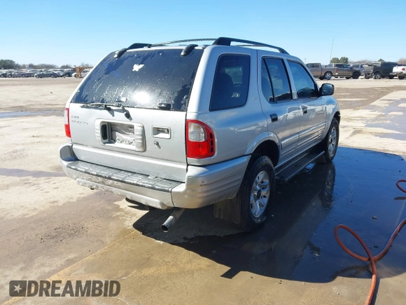 2002 Isuzu Rodeo S with VIN 4S2CK58WX24321556, listed as a IAAI auction lot 41405981 with 172,590 mi miles and . Bid and sale history available at DreamBid. Image 4.