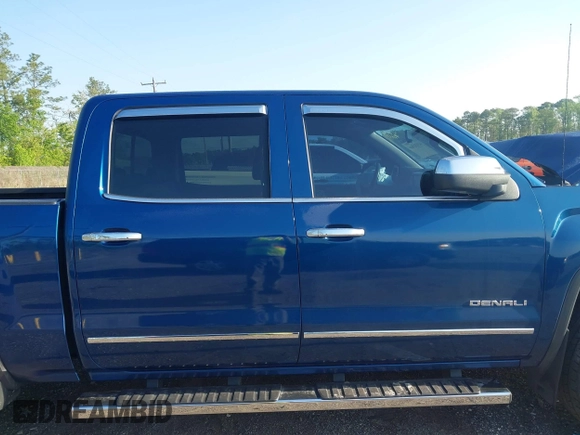 2015 GMC Sierra 1500 Denali z VIN 3GTP1WEC2FG201307, wystawiony jako IAAI lot #41931366 z przebiegiem 99 644 mil mil oraz . Historia ofert i sprzedaży dostępna na DreamBid. Obrazek 12.
