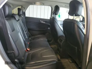 2017 Ford Edge Titanium z VIN 2FMPK4K81HBB72398, wystawiony jako Copart lot #55325635 z przebiegiem 112 917 mil mil oraz Nie do naprawy • Non repairable. Historia ofert i sprzedaży dostępna na DreamBid. Obrazek 10.