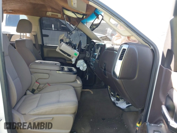 2018 Chevrolet Silverado 1500 LT with VIN 3GCUCRER0JG286336, listed as a IAAI auction lot 41738980 with 124,612 mi miles and . Bid and sale history available at DreamBid. Image 5.