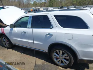 2013 Dodge Durango Crew with VIN 1C4RDHDG8DC698668, listed as a IAAI auction lot 41876841 with 160,012 mi miles and . Bid and sale history available at DreamBid. Image 14.