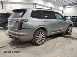 2020 Cadillac XT6 AWD Sport with VIN 1GYKPGRS5LZ145966, listed as a Copart auction lot 66585334 with 76,735 mi miles and Salvage Title. Bid and sale history available at carsss.com. Image 3.