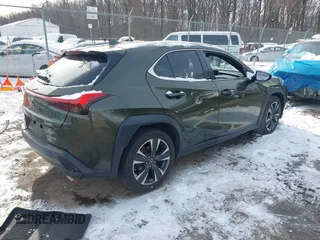 2021 Lexus UX with VIN JTHX3JBH9M2040066, listed as a IAAI auction lot 41256663 with 48,638 mi miles. Bid and sale history available at carsss.com. Image 4.