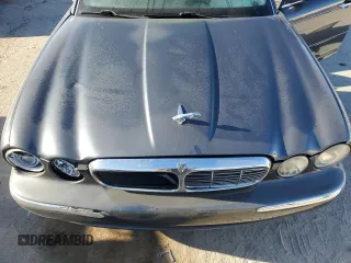 2004 Jaguar XJ VDP with VIN SAJWA74C54SG18384, listed as a Copart auction lot 83081974 with 141,664 mi miles and Salvage Title. Bid and sale history available at carsss.com. Image 11.